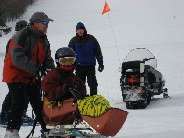 One of the volunteers helping with the ski
