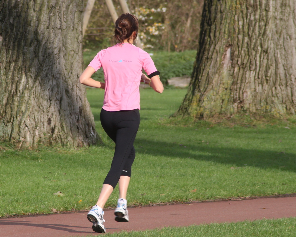 back of a woman running