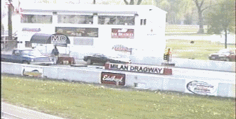 14.5 @ 98 MPH  - - - I was new at driving a 6 speed